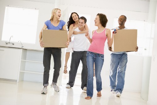 Removal van and moving boxes for a home move in Old Malden