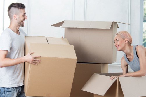 Packed office furniture and equipment ready for relocation