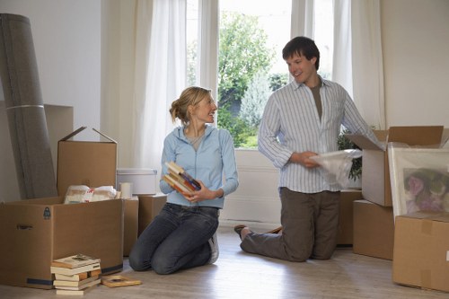 Preparing boxes and belongings for a move in Old Malden